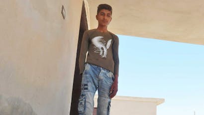 Portretfoto van Shafiq, 16 jarige jongen