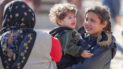 Portretfoto van twee verdrietige kinderen in Syrië